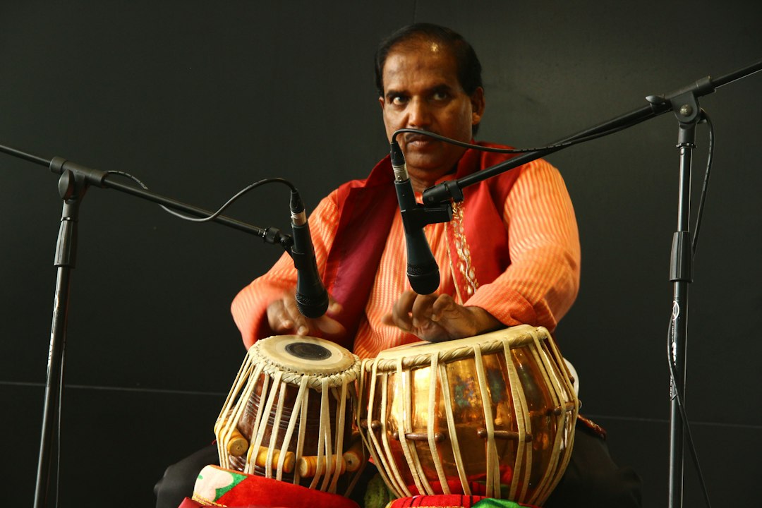 man playing a drum instrument