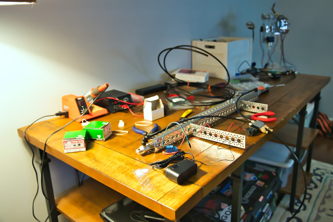 I'm prepping for my Halloween IOT project and my desk is filled with electronics, structural channel, pneumatic cylinders, and actobotics. This phase is when the creativity really comes to life when code on the internet affects objects in real life. It's a messy process, but worth it in the end. by Uniphonic black travel charger