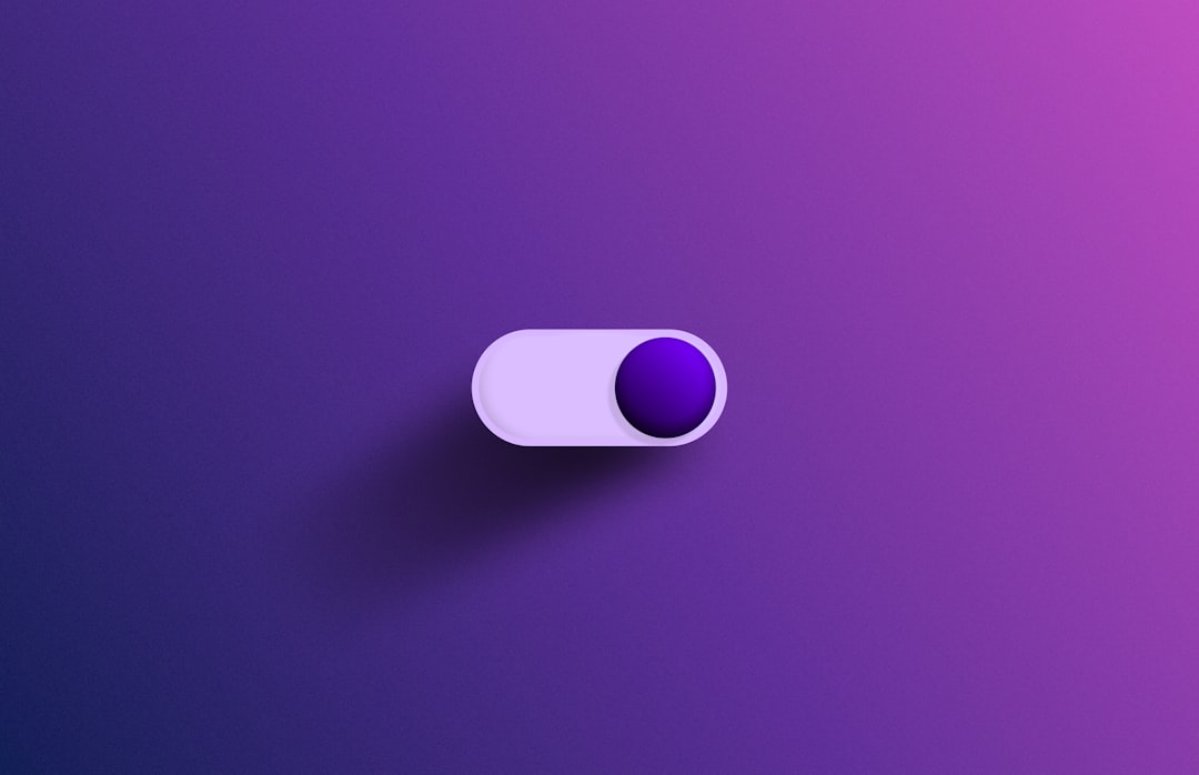 Simple UI toggle on purple gradient by Uniphonic a purple and white object on a purple background